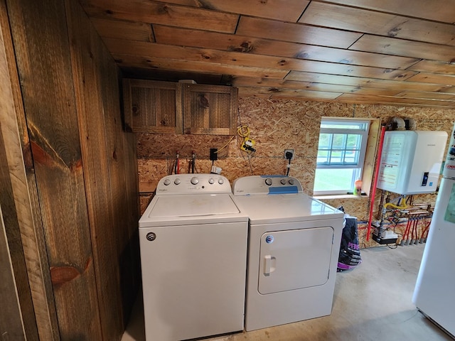 laundry area with wood ceiling and washer and dryer