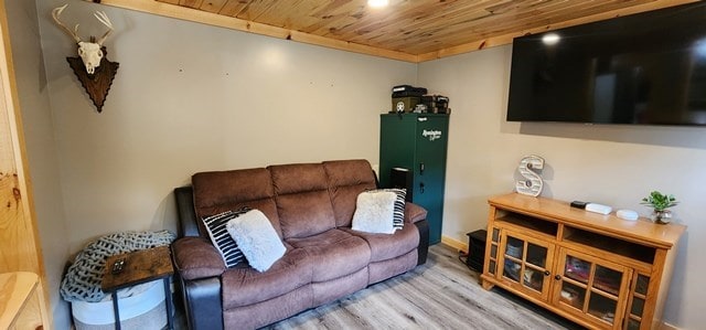 living room with wood-type flooring and wood ceiling