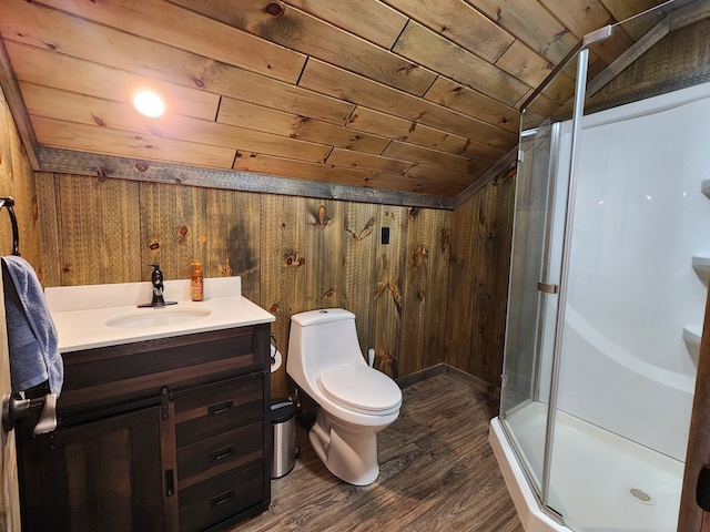 bathroom featuring wooden ceiling, wood walls, hardwood / wood-style floors, vaulted ceiling, and vanity