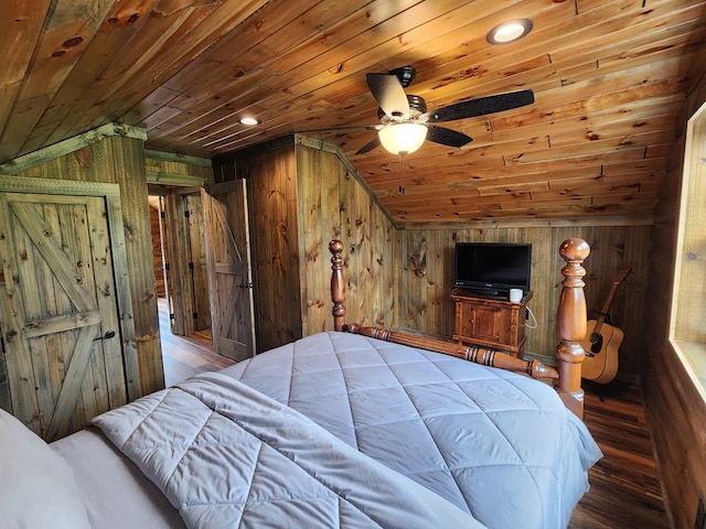 bedroom featuring wood ceiling, ceiling fan, lofted ceiling, and wooden walls