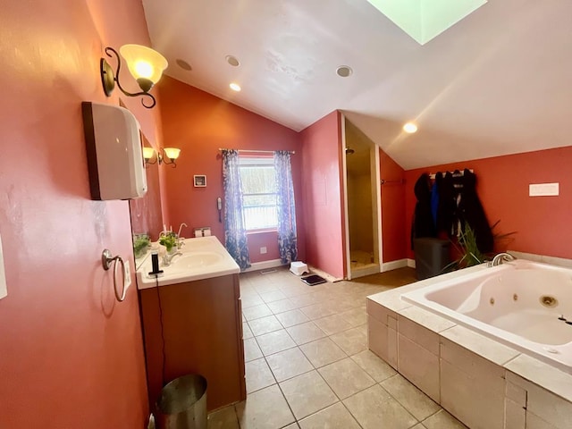 bathroom featuring tiled tub, tile patterned floors, vanity, and lofted ceiling