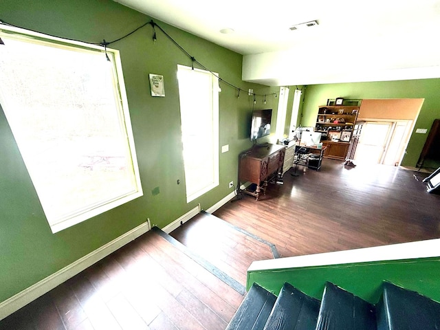 interior space featuring dark wood-type flooring