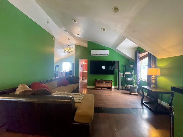 living room featuring hardwood / wood-style flooring, a chandelier, lofted ceiling, and a wall mounted AC