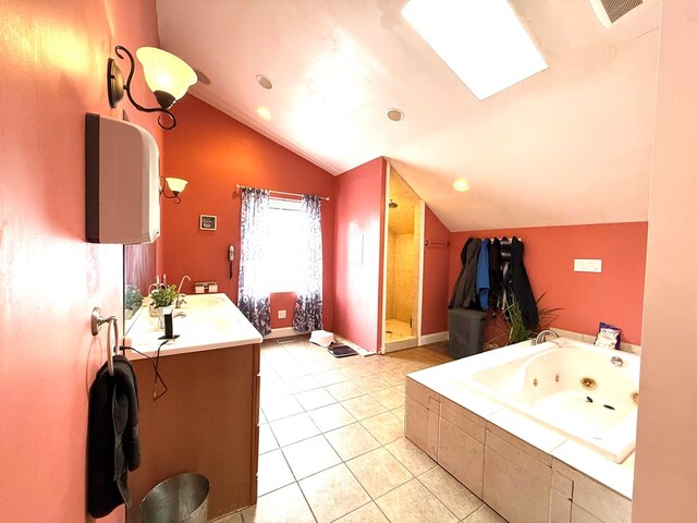 bathroom with tile patterned floors, vanity, independent shower and bath, and vaulted ceiling