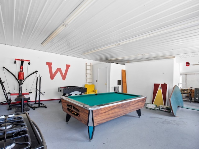 playroom featuring concrete flooring