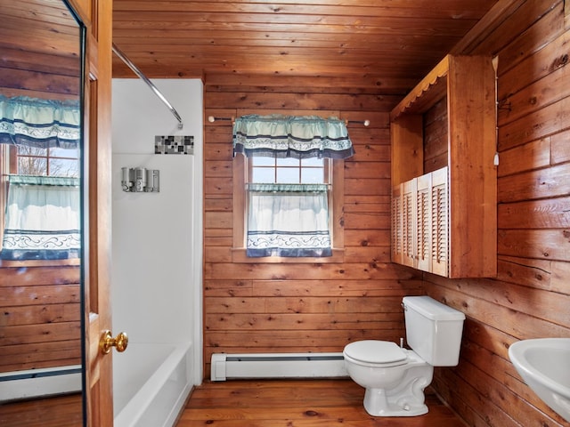 full bath with a sink, a baseboard heating unit, toilet, and wood ceiling