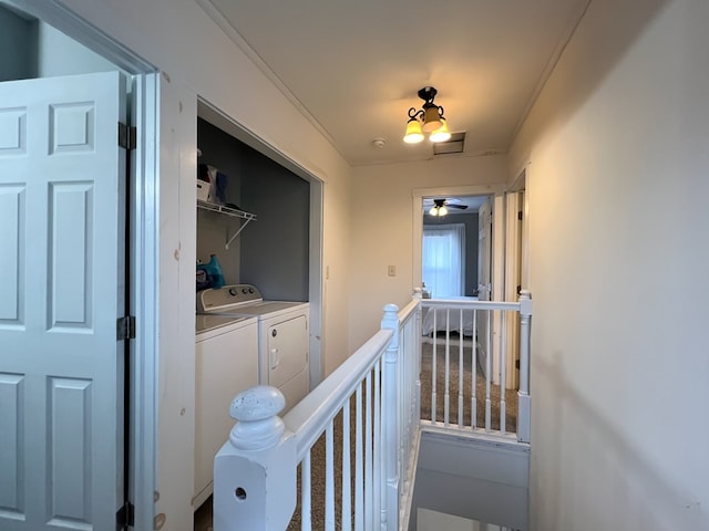 corridor featuring independent washer and dryer