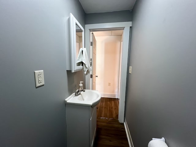 bathroom featuring vanity and hardwood / wood-style flooring