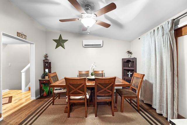 4060 Wilawana Rd, Sayre, PA 18840 - dining space with a wall mounted air conditioner, wood finished floors, ceiling fan, lofted ceiling, and stairway