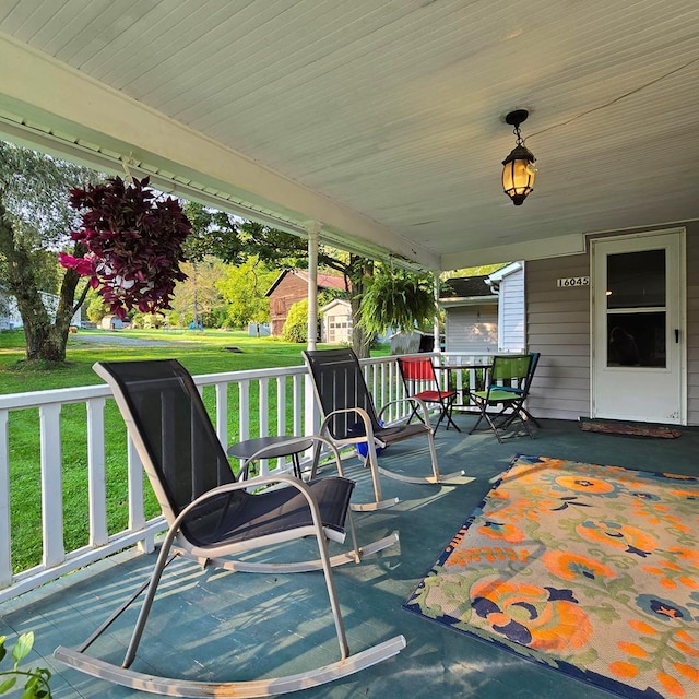 view of patio featuring a porch