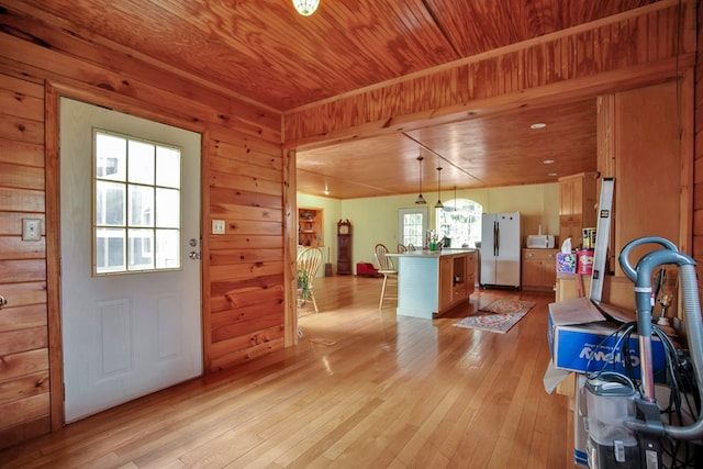 157 Shelmire Rd, Wellsboro, PA 16901 - entryway featuring light wood finished floors, wood ceiling, and wood walls