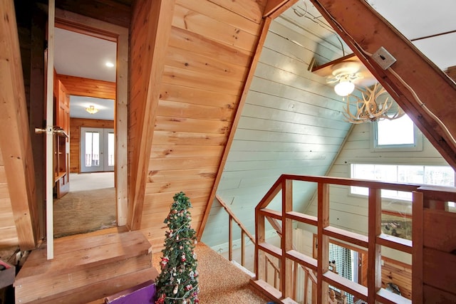 157 Shelmire Rd, Wellsboro, PA 16901 - interior space with an upstairs landing, wooden walls, carpet flooring, and a healthy amount of sunlight