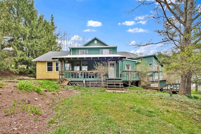 157 Shelmire Rd, Wellsboro, PA 16901 - rear view of house with a lawn, roof with shingles, a wooden deck, and a sunroom