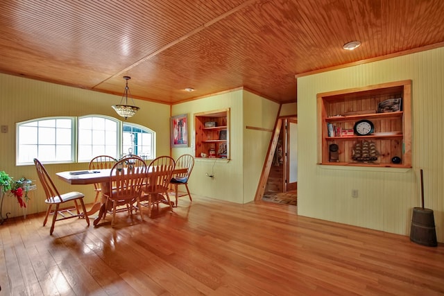 157 Shelmire Rd, Wellsboro, PA 16901 - dining space featuring wood ceiling, wood walls, wood finished floors, and built in shelves