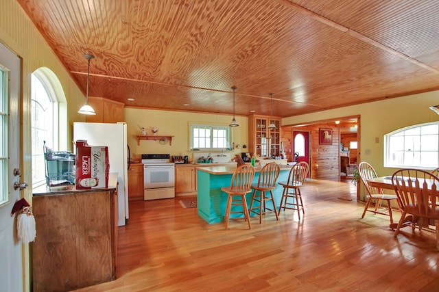 157 Shelmire Rd, Wellsboro, PA 16901 - kitchen featuring white appliances, light wood-style flooring, a kitchen bar, wood ceiling, and hanging light fixtures