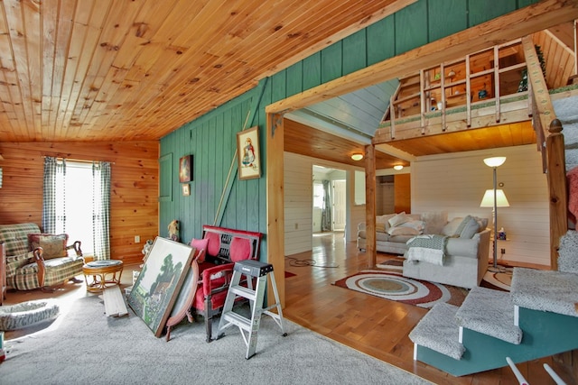 157 Shelmire Rd, Wellsboro, PA 16901 - living area featuring lofted ceiling, wooden walls, wood ceiling, and wood finished floors