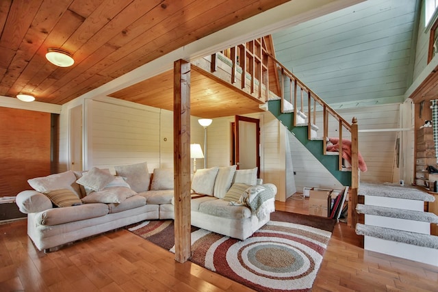 157 Shelmire Rd, Wellsboro, PA 16901 - living room featuring wood ceiling, stairway, wood walls, and wood-type flooring
