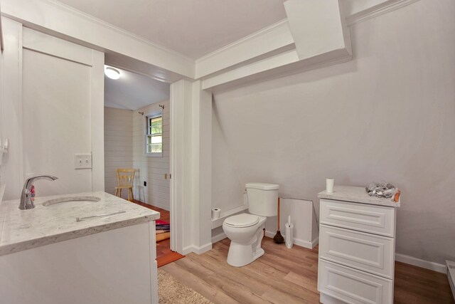 157 Shelmire Rd, Wellsboro, PA 16901 - bathroom with toilet, wood finished floors, crown molding, baseboards, and vanity