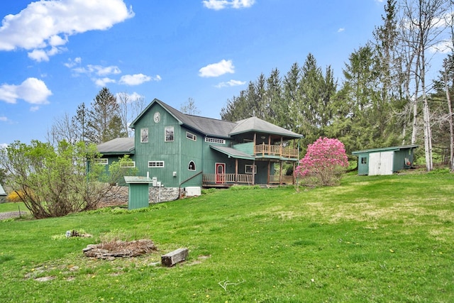 157 Shelmire Rd, Wellsboro, PA 16901 - rear view of property featuring a yard, a storage shed, and a wooden deck
