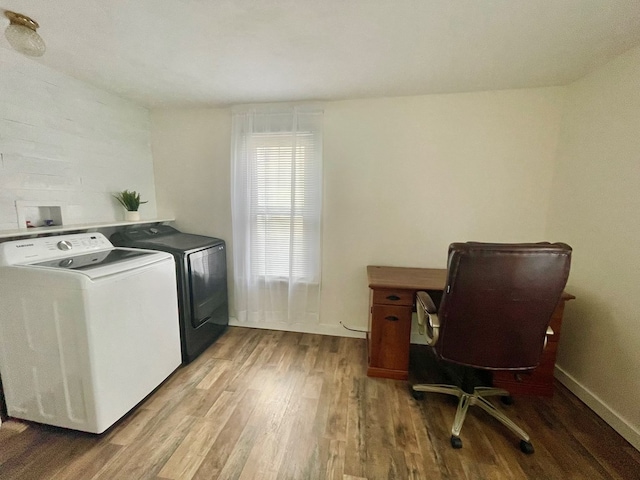 114 Elsbree St, Sayre, PA 18840 - washroom featuring washing machine and clothes dryer and wood finished floors