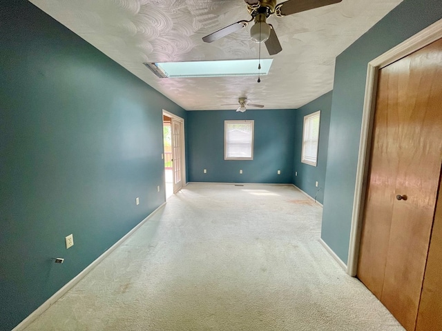 114 Elsbree St, Sayre, PA 18840 - carpeted spare room with ceiling fan, plenty of natural light, and baseboards