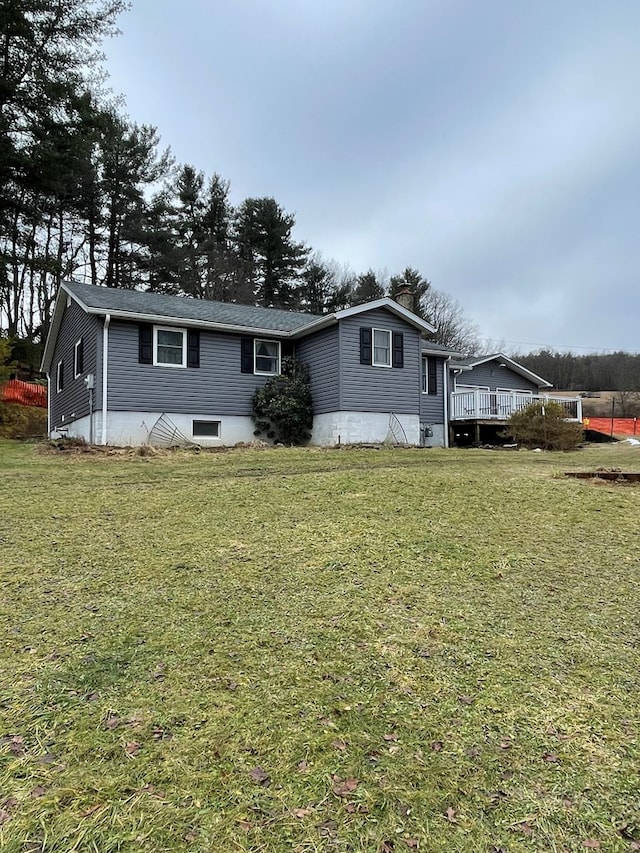 view of front of home with a front yard