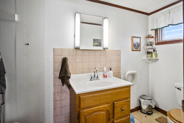 2779 Stony Fork Rd, Wellsboro, PA 16901 - bathroom featuring toilet, ornamental molding, vanity, decorative backsplash, and baseboards