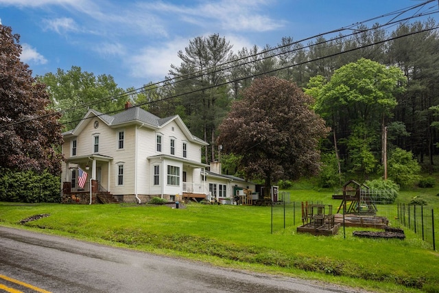 2779 Stony Fork Rd, Wellsboro, PA 16901 - view of side of property with a vegetable garden, a lawn, and a chimney