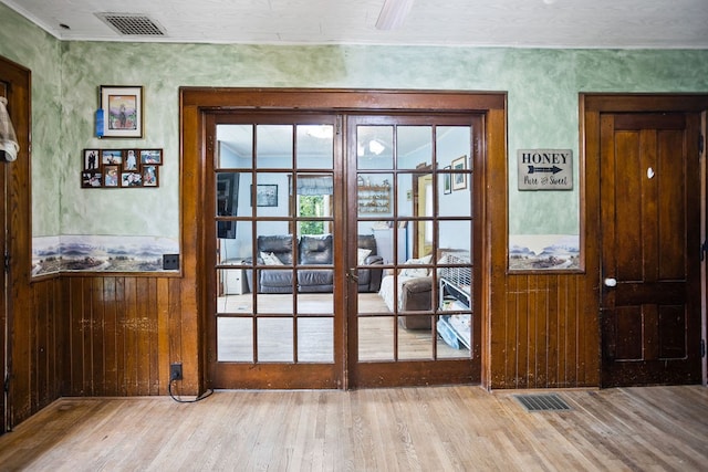 2779 Stony Fork Rd, Wellsboro, PA 16901 - doorway to outside with french doors, wood finished floors, and wood walls