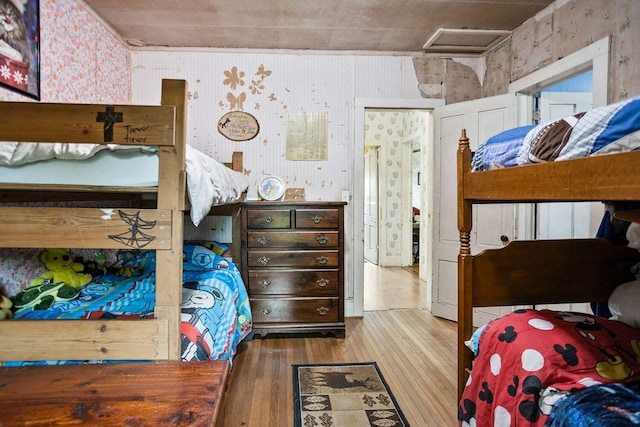 2779 Stony Fork Rd, Wellsboro, PA 16901 - bedroom featuring hardwood / wood-style floors, attic access, and wallpapered walls