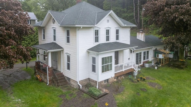 2779 Stony Fork Rd, Wellsboro, PA 16901 - view of front facade featuring a chimney, a front lawn, and a shingled roof