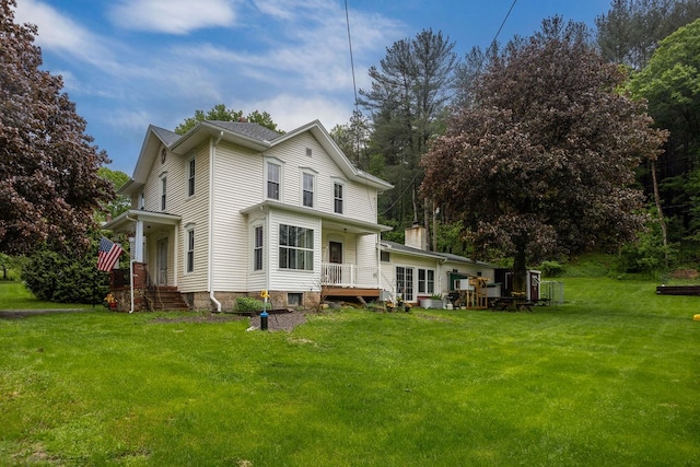 2779 Stony Fork Rd, Wellsboro, PA 16901 - rear view of house with a lawn