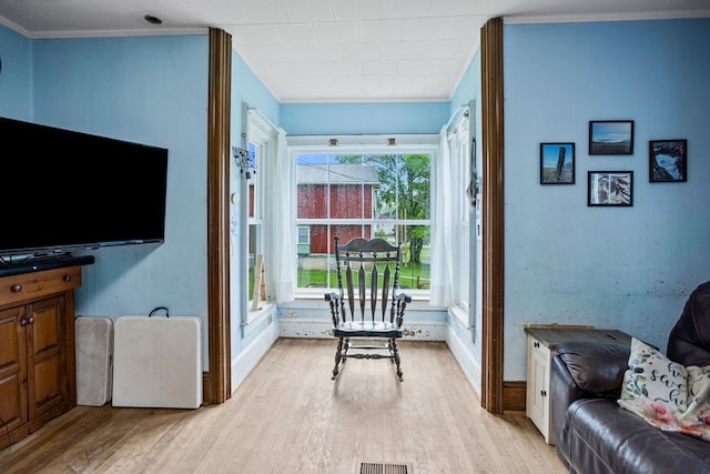 2779 Stony Fork Rd, Wellsboro, PA 16901 - living area with light wood-style flooring, ornamental molding, and baseboards