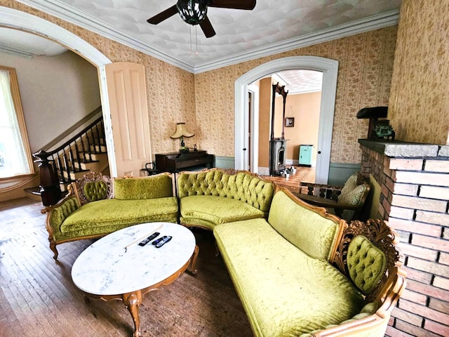 440 Park Ave, Waverly, NY 14892 - living area featuring wallpapered walls, ceiling fan, a wainscoted wall, hardwood / wood-style flooring, and stairway
