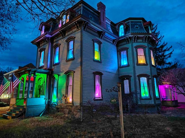 440 Park Ave, Waverly, NY 14892 - view of front of home with mansard roof and a chimney