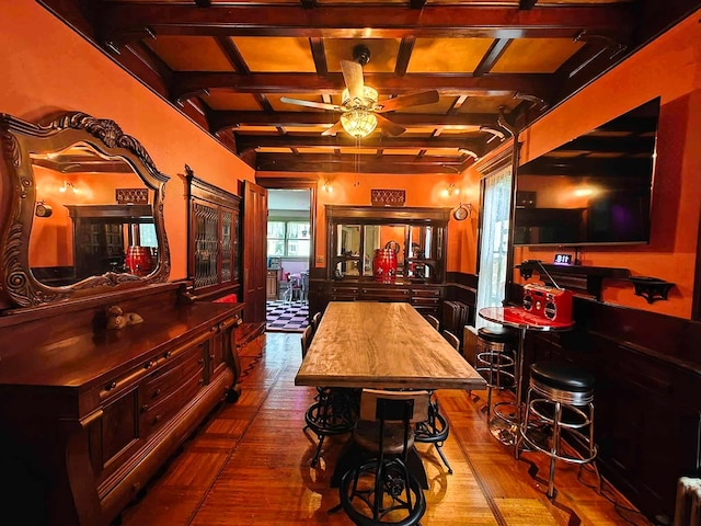 440 Park Ave, Waverly, NY 14892 - bar area featuring ceiling fan, coffered ceiling, dark wood finished floors, and beamed ceiling