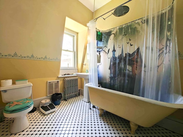 440 Park Ave, Waverly, NY 14892 - bathroom featuring radiator, a freestanding tub, a shower with curtain, and heating unit