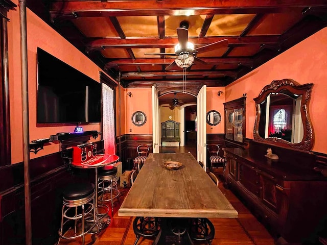 440 Park Ave, Waverly, NY 14892 - dining room with ceiling fan, coffered ceiling, wood finished floors, and arched walkways