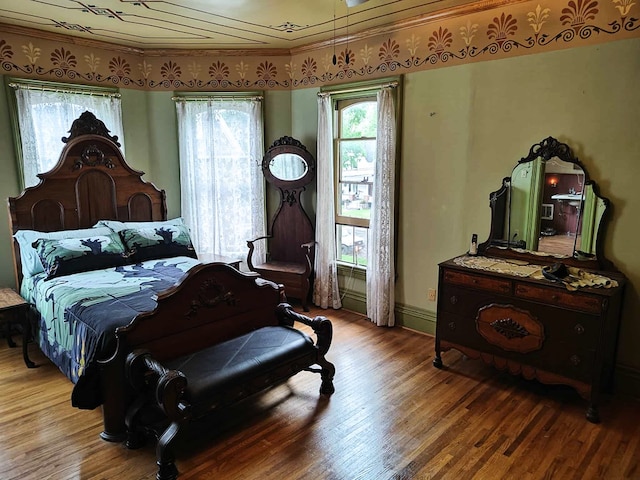 440 Park Ave, Waverly, NY 14892 - bedroom with wood finished floors and crown molding