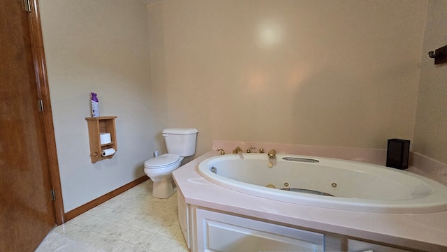 8065 Rte 414, Liberty, PA 16930 - bathroom featuring toilet, a jetted tub, and baseboards