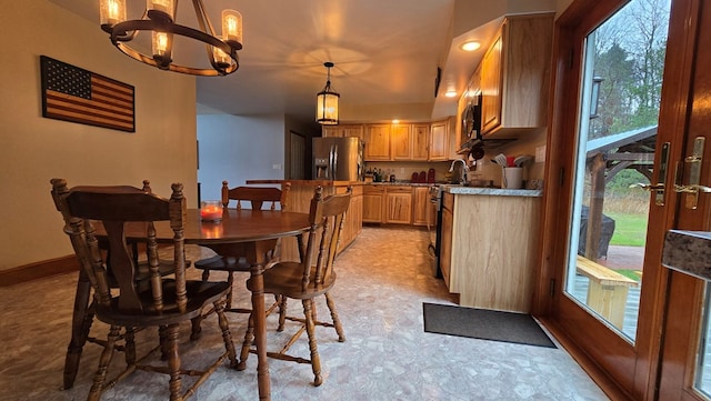 8065 Rte 414, Liberty, PA 16930 - dining area featuring a chandelier, baseboards, and light floors