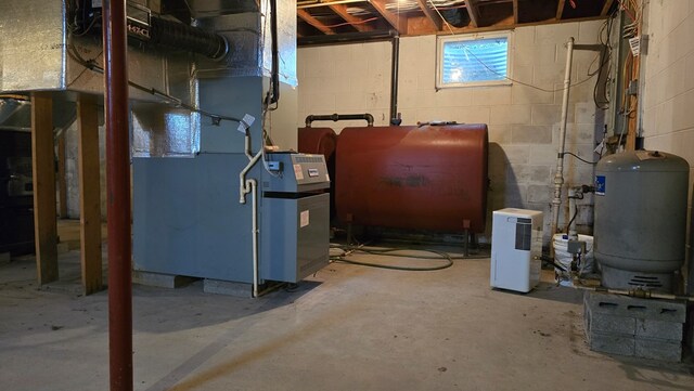 8065 Rte 414, Liberty, PA 16930 - utility room with heating unit and heating fuel