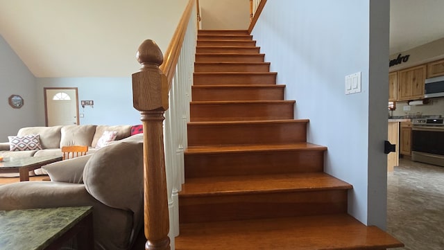 8065 Rte 414, Liberty, PA 16930 - staircase with carpet and lofted ceiling