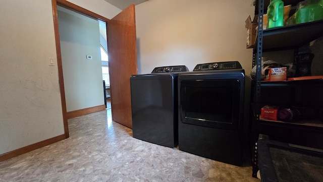 8065 Rte 414, Liberty, PA 16930 - laundry area with tile patterned floors, washer and dryer, laundry area, and baseboards