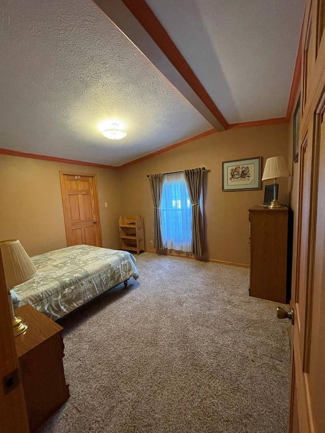 carpeted bedroom with a textured ceiling, lofted ceiling, and ornamental molding