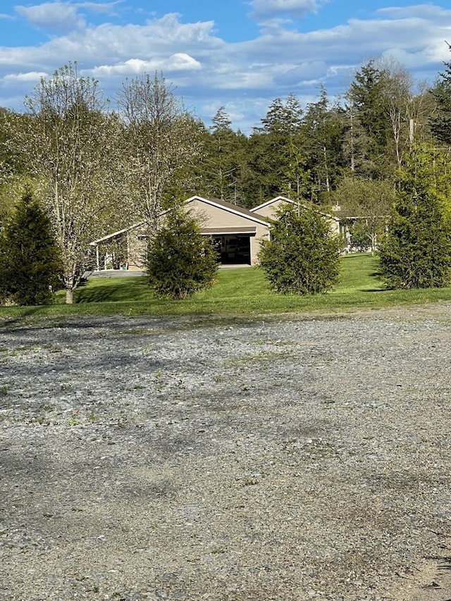 exterior space featuring a front yard