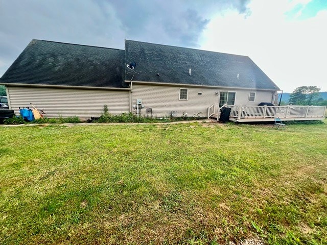 19 Angel Trl, Duke Center, PA 16729 - rear view of house with a wooden deck and a lawn
