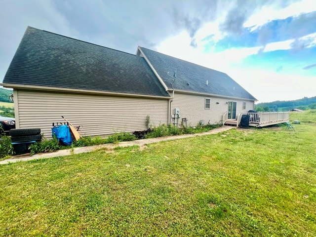 19 Angel Trl, Duke Center, PA 16729 - view of property exterior with a wooden deck and a lawn