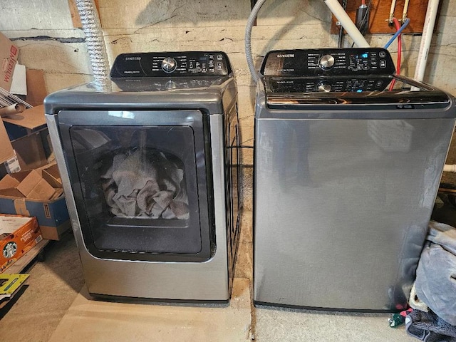 409 E Main St, Elkland, PA 16920 - laundry area with washing machine and clothes dryer