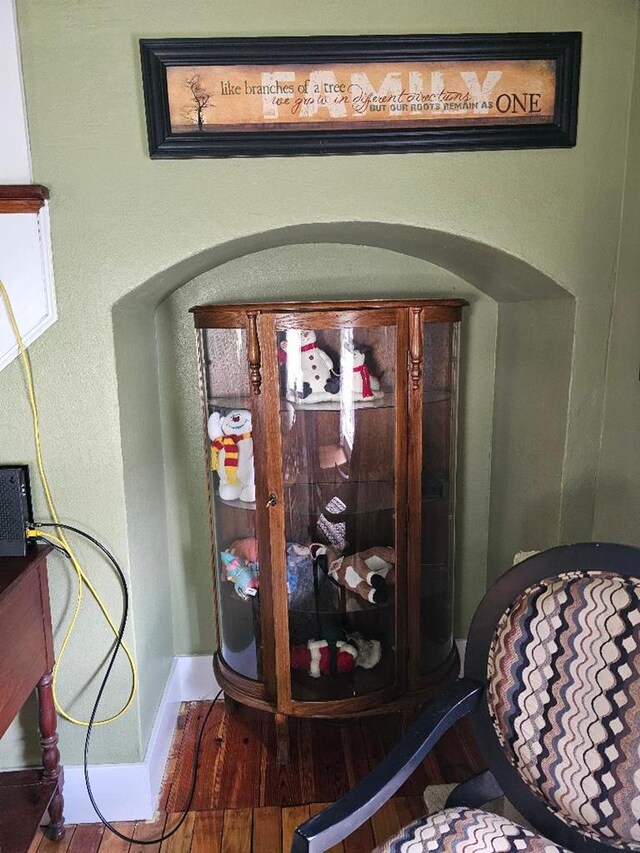 409 E Main St, Elkland, PA 16920 - detailed view of baseboards, wood finished floors, and arched walkways